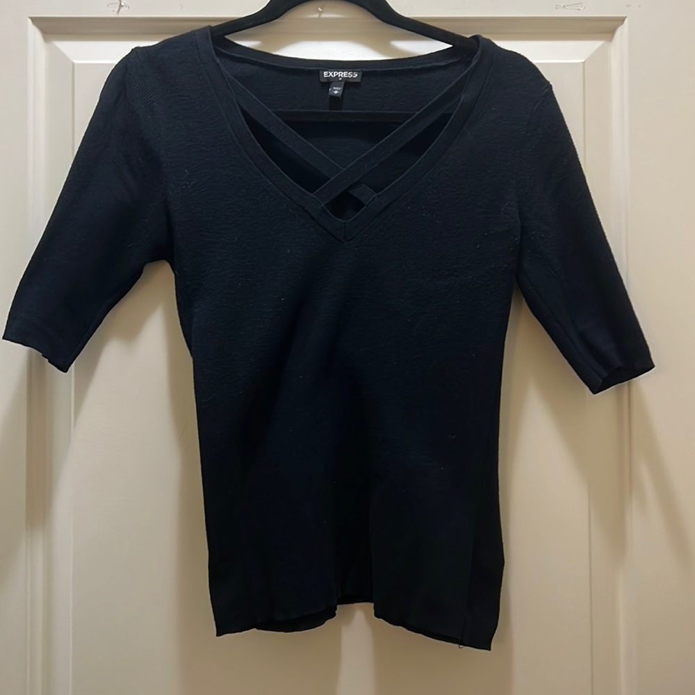 Express black short sleeve sweater. With crisscross design on the front.
